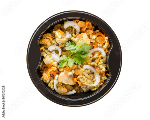 A dish in a black disposable container from catering on a concrete background, dietary catering, ready meals with you, healthy food