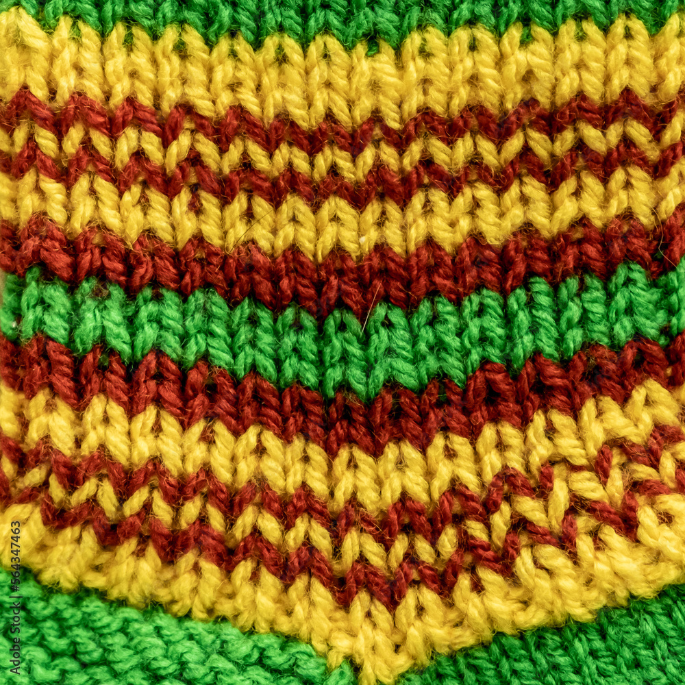 The texture of a knitted fabric with a pigtail pattern