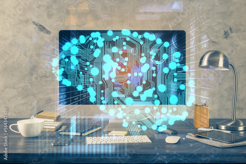 Double exposure of table with computer and brain hologram. Data innovation concept.
