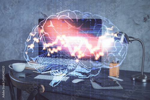 Double exposure of table with computer and brain hologram. Data innovation concept.