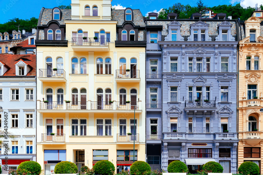 Colorful ornate historic building facade. Front view. Karlovy Vary, Czech Republic