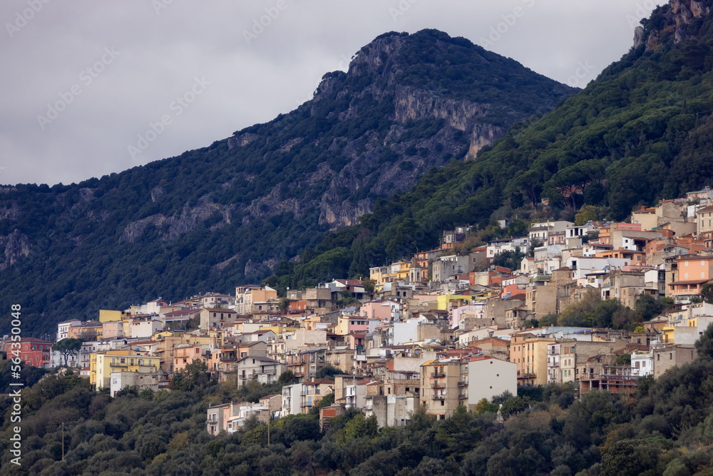 Small Touristic Town, Baunei, in the Mountains of Sardinia, Italy. Cloudy Rainy Day. Fall Season