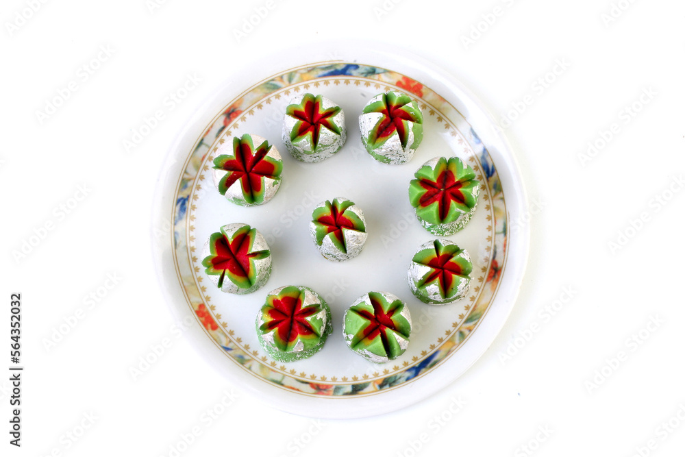Indian delicious sweets and Mithai on a plate for festival Indian delicious sweets and Mithai on a plate for festival