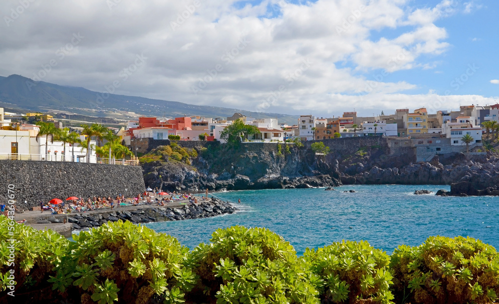 Picturesque view of Alcala village with volcanic beach in the distance in Tenerife, Canary Islands,Spain.
Selective focus.