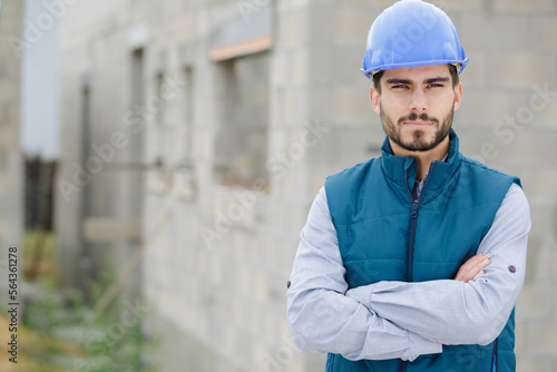 male engineer or architect with crossed arms