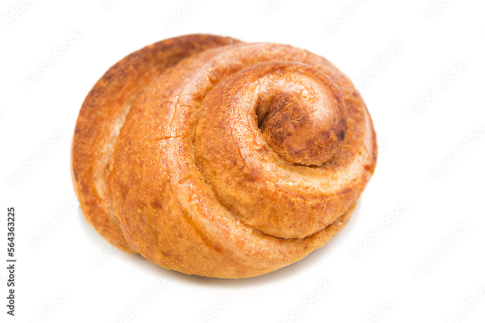 Fototapeta premium Whole freshly baked cinnamon bun isolated on white background. 