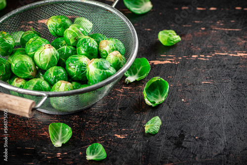 Brussels sprouts in a colander.  © Artem Shadrin