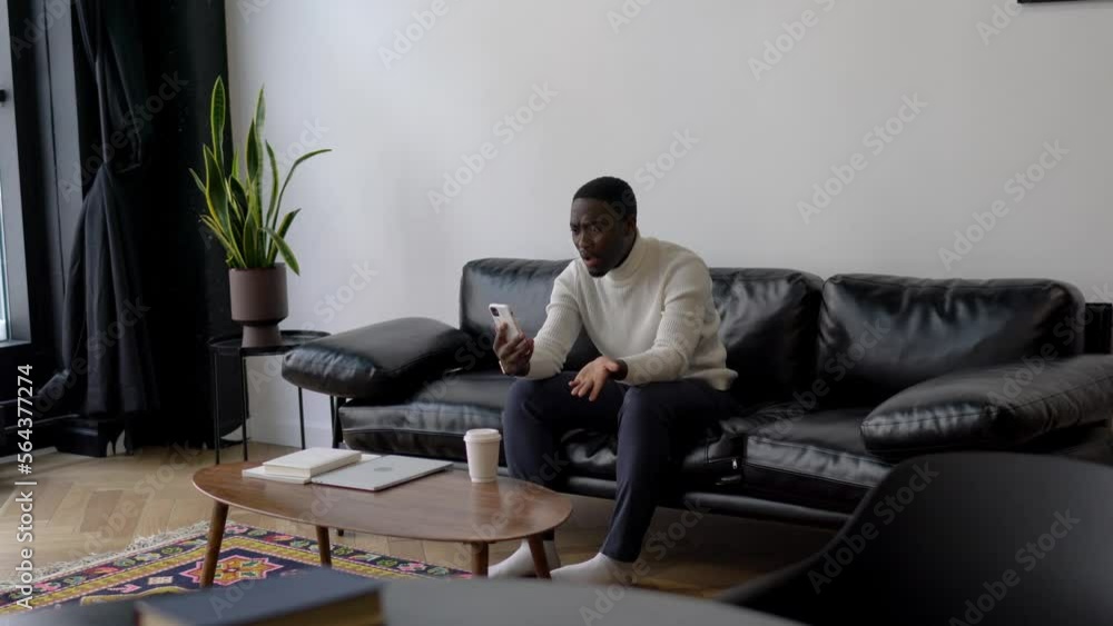 Excited dark skinned hipster guy enjoying phone video calling via application on cellular, happy man feeling amazed during conversation on mobile phone satisfied with wireless internet
Excited dark skinned hipster guy enjoying phone video calling via application on cellular, happy man feeling amazed during conversation on mobile phone satisfied with wireless internet