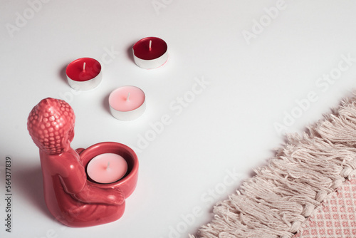 Product empty space, isometric view. Pink candle and Budda mockup
