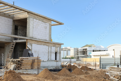 View of unfinished cottage on construction site
