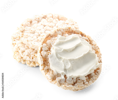 Crispbreads with tasty cream cheese on white background