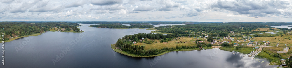 Aerial view of the nature of Karelia. Ladoga lake. Panorama of nature and private houses from above