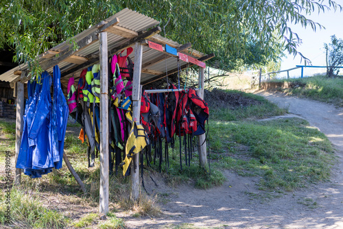 Life vests for kayak tours hanging in a shelter at the beach of Lago General Carrera near Puerto Rio Tranquilo, Chile 