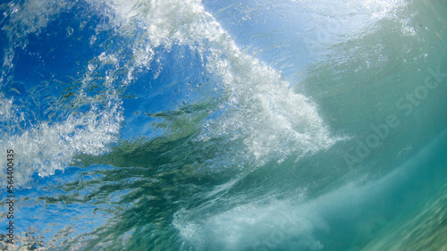 Underwater view of underneath a wave.
