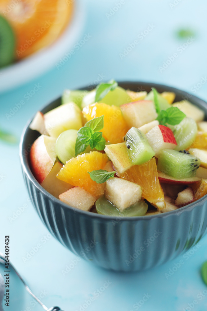 A bowl with fresh fruit salad