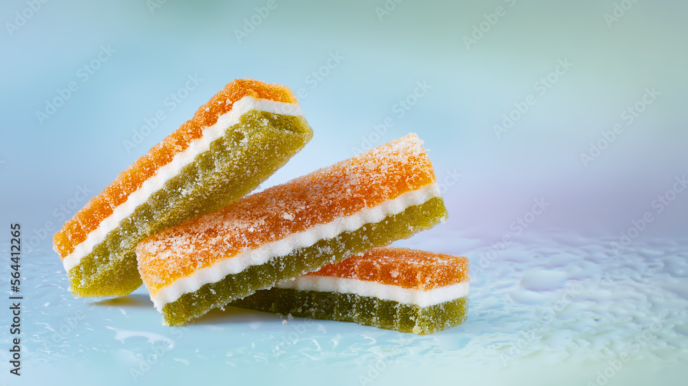 Colored marmalade in sugar. Fruit jelly on an abstract background. Gummy candy. Fruit sweets Colored marmalade in sugar. Fruit jelly on an abstract background. Gummy candy. Fruit sweets