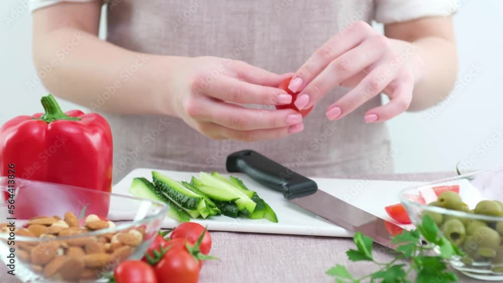 Smiling young woman serving fresh salad on plate. Happy smiling cute woman cooking fresh healthy vegan salad at home with many vegetables in kitchen and trying new recipe High quality photo Smiling young woman serving fresh salad on plate. Happy smiling cute woman cooking fresh healthy vegan salad at home with many vegetables in kitchen and trying new recipe High quality photo