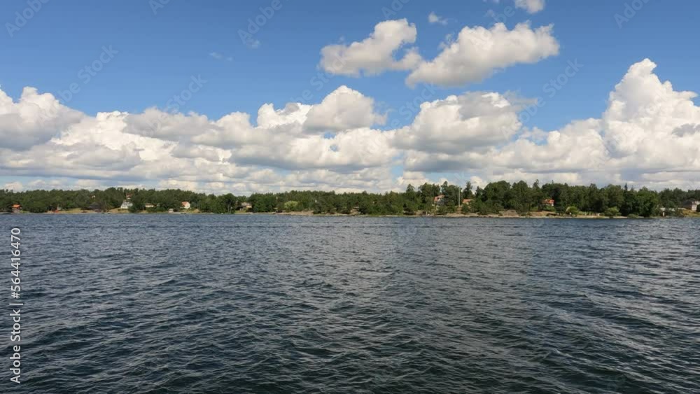 Scenic panning video of Stockholm Archipelago coast, summer time. Video is taken from moving tourist boat Scenic panning video of Stockholm Archipelago coast, summer time. Video is taken from moving tourist boat