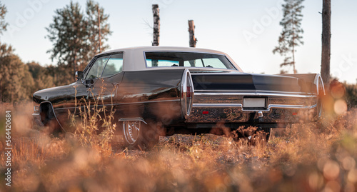American car, black and white old retro car with tail lights