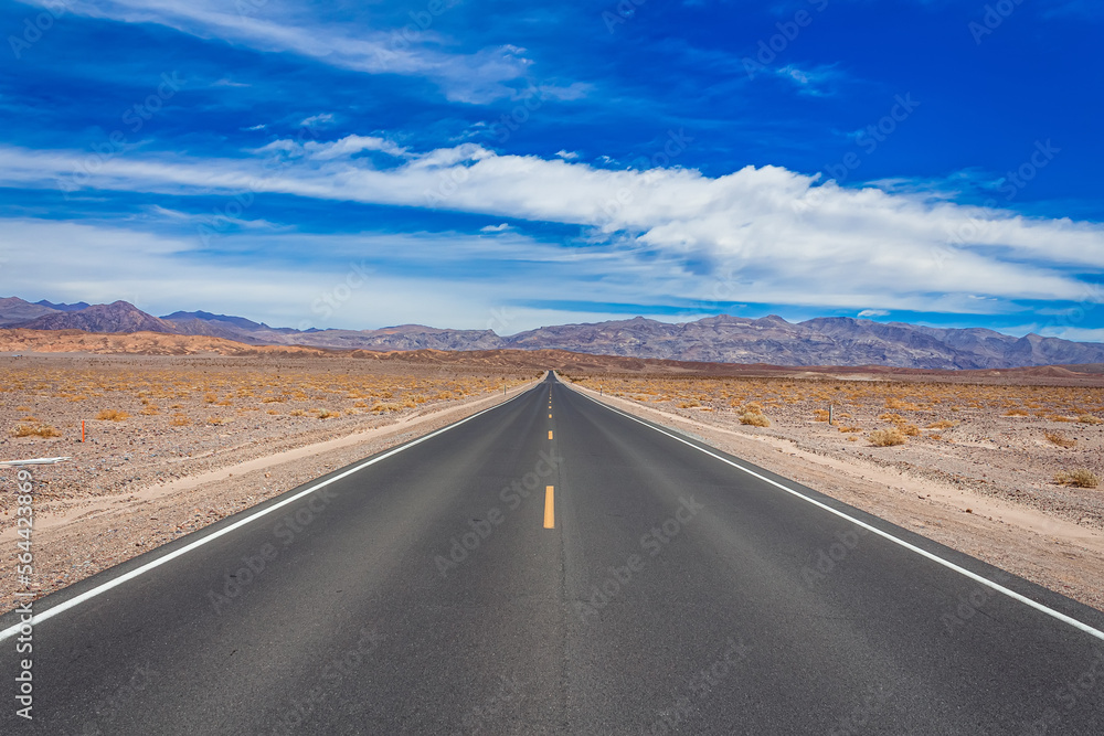 Endless straight highway crossing the Mojave desert