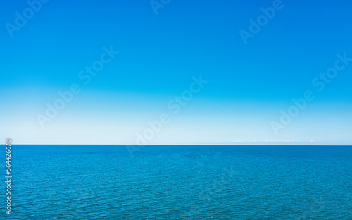 Horizon line, blue sky and blue sea. Drone view © maykal