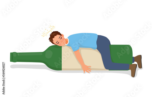 Drunk young man lying on alcohol bottles