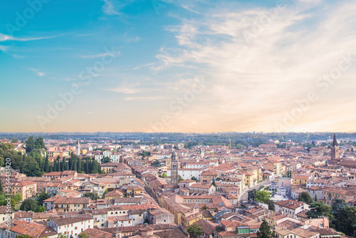 Beautiful view of the panorama of Verona and the Lamberti tower on the banks of the Adige River in Verona, Italy