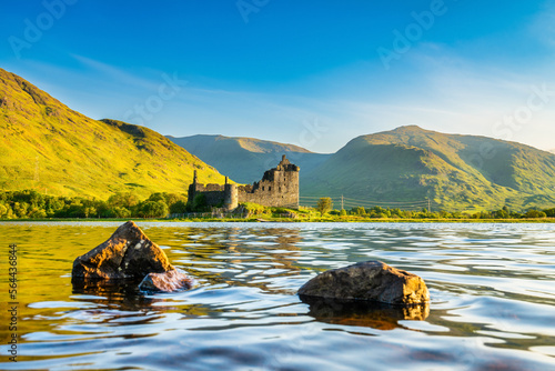 The ruins of Kilchurn castle at sunset on Loch Awe, the longest fresh water loch in Scotland photo