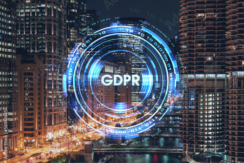 Illuminated aerial city panorama of Chicago Riverwalk downtown area, Boardwalk with bridges, night time, Illinois, USA. GDPR hologram, concept of data protection regulation and privacy for individuals