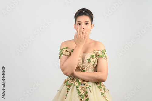 Young asian beautiful bride pose with excited feel on white background