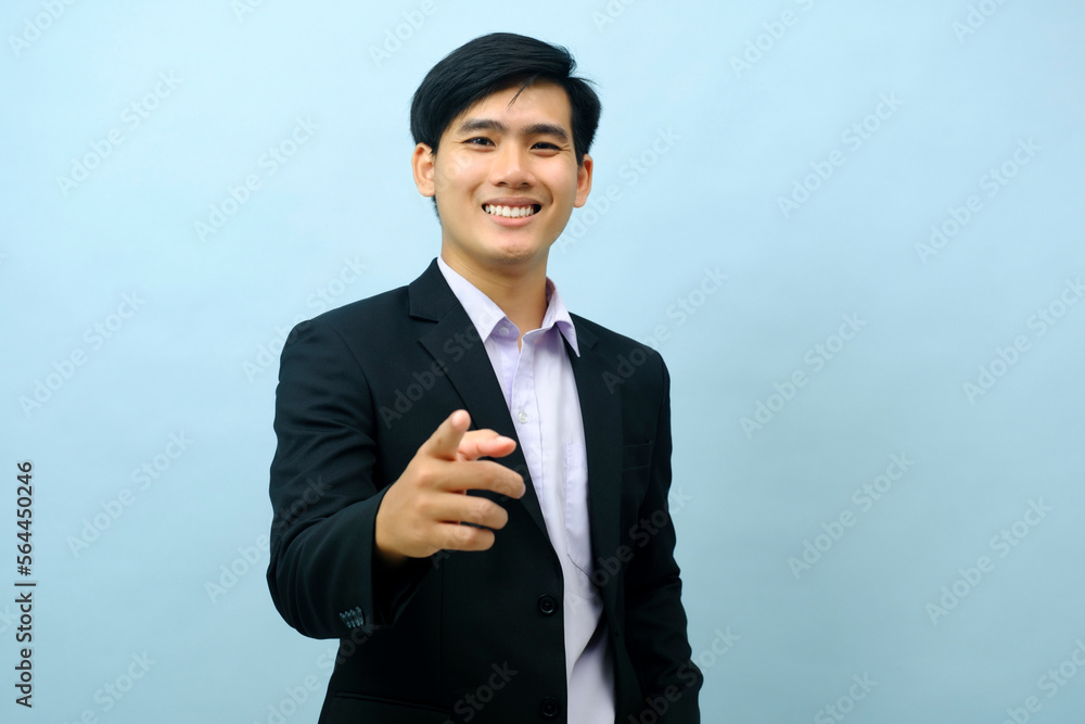 Portrait of businessman pointing at camera. Portrait of businessman pointing at camera.