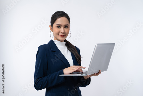 Happy young Asian businesswoman holding laptop computer isolated on white background.