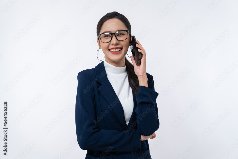 Happy young Asian businesswoman in a glasses with smile speaking on smartphone isolated on white background. Happy young Asian businesswoman in a glasses with smile speaking on smartphone isolated on white background.