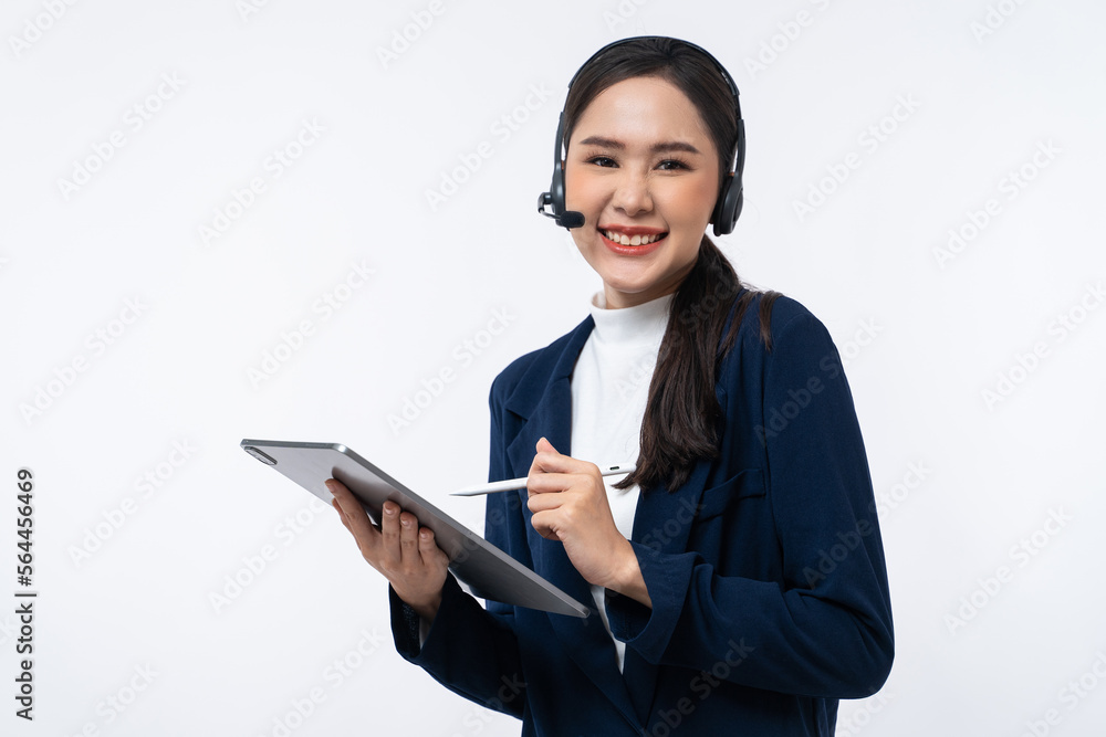 Happy young Asian operator woman agent with headsets working in a call center using tablet isolated on white background.