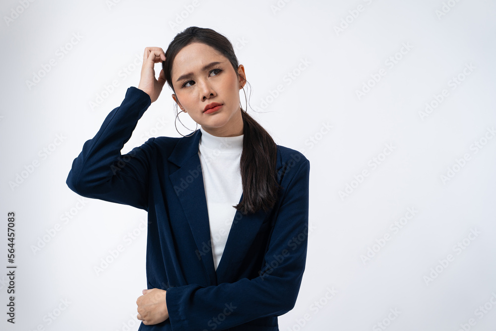 Tired Asian businesswoman in stress works isolated on white background. Tired Asian businesswoman in stress works isolated on white background.