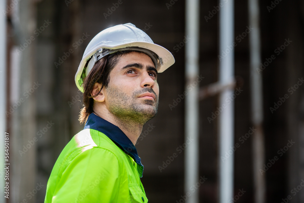 Close up man engineer builder house construction. male architect standing at home construction. foreman in workplace. Close up man engineer builder house construction. male architect standing at home construction. foreman in workplace.