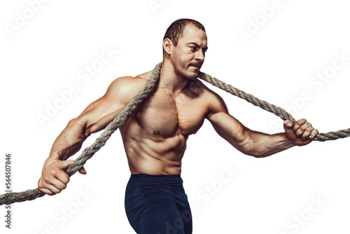 Strong bodybuilder holds rope hanging on neck and shoulders while posing on white background