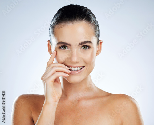 Skincare, face and happy woman isolated in white background in natural cosmetics, makeup glow and smile. Brazilian model or person in portrait for dermatology results, facial or beauty in a studio