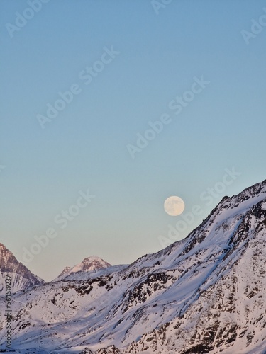 Moon above the mountains in Val Thorens Ski Resort