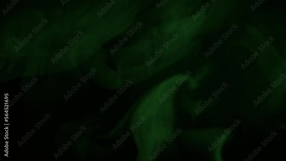 Black background, shimmering green eerie steam, can be used for compositing, effects, etc. Black background, shimmering green eerie steam, can be used for compositing, effects, etc.
