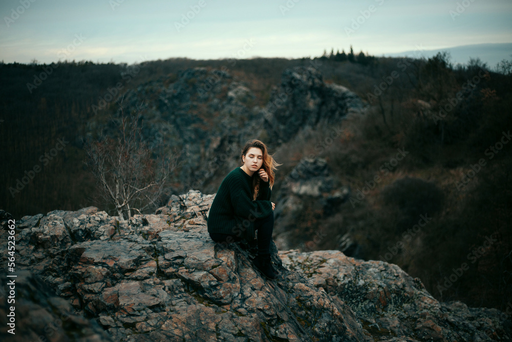 Fashionable young girl with messy hair in sweater outdoor Fashionable young girl with messy hair in sweater outdoor