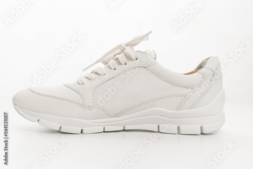 leather sneakers with lacing on a white background. 