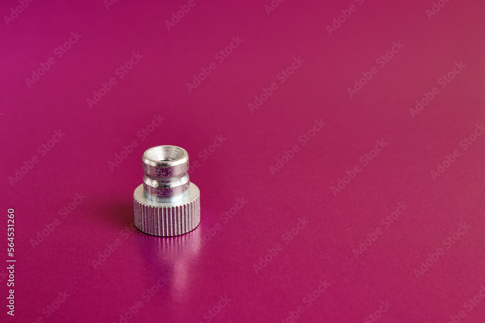 Grooved pressure nut for manual screwing. The concept of threaded connection elements. Grooved pressure nut for manual screwing. The concept of threaded connection elements.