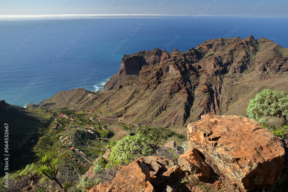 View towards the valley of Taguluche in La Gomera, Canary Islands, Spain, in the West of the Island, with plunging cliffs. Picture taken from a hiking trail near Arure leading to Alojera 