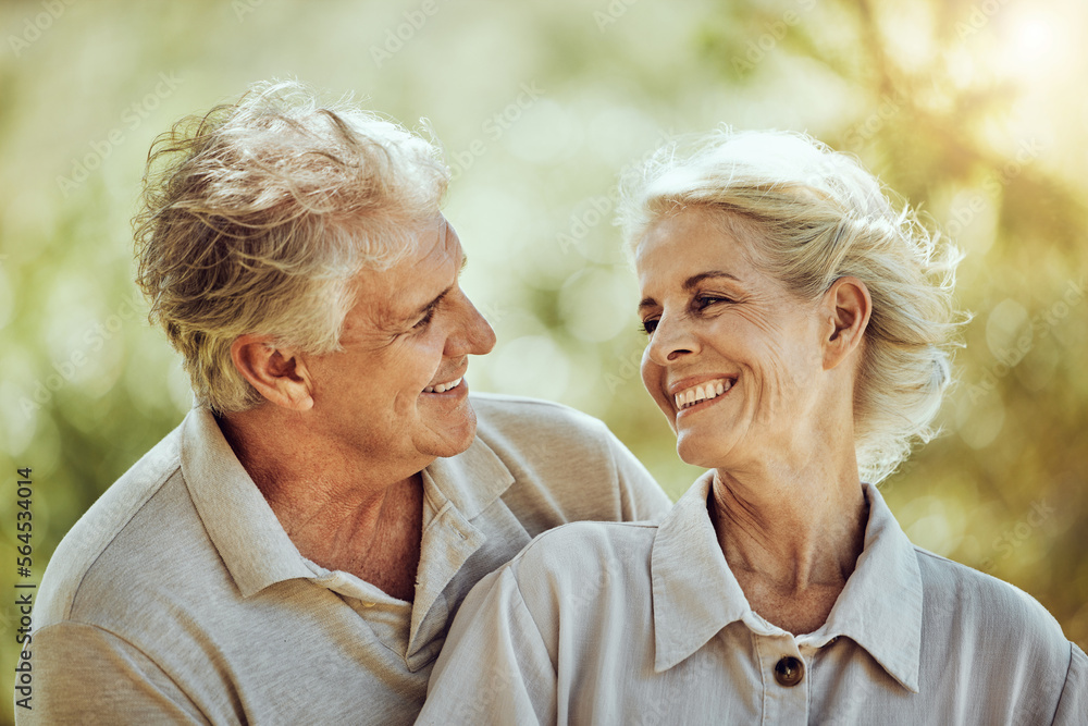 Love, hug or happy old couple in nature bonding or laughing in a marriage partnership in retirement. Peace, senior man or romantic elderly woman hugging together on a calm relaxing holiday vacation