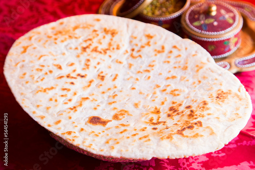 Naan is a flat bread, made from wheat flour and usually leavened. It is commonly consumed in several regions of Central Asia and South Asia: Afghanistan, Iran, Uzbekistan, Burma, Pakistan, and northwe