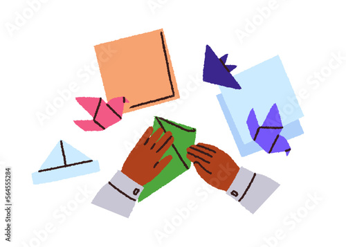 Kids hands making paper toys. Origami, Japan asian art concept. African child...