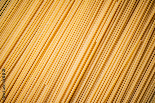 Unprepared spaghetti dry. Macro background.