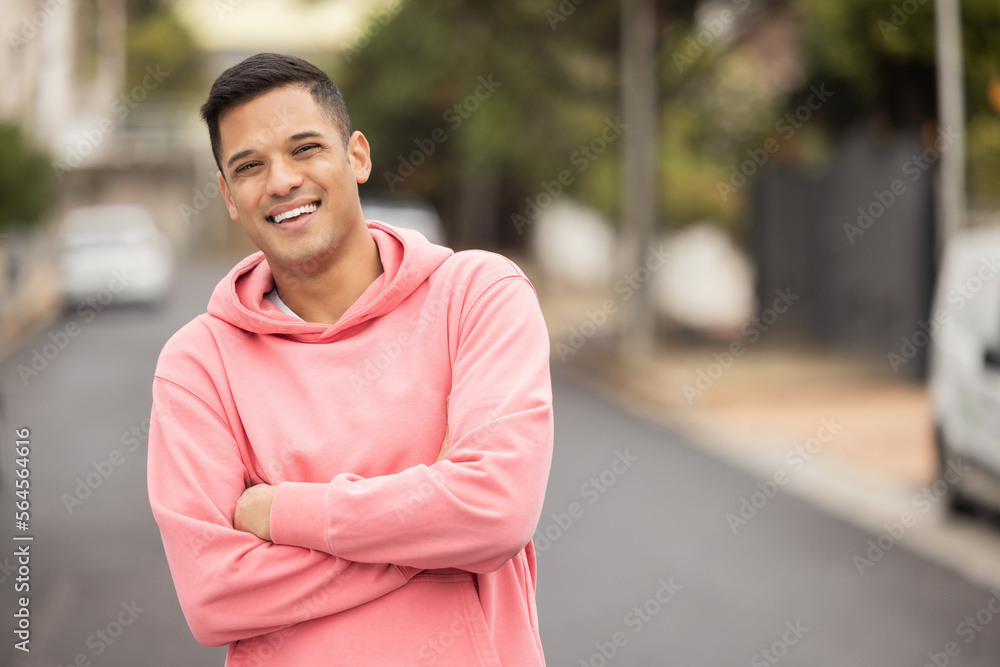 Portrait, happy and man in a street for travel, explore and proud against a blurred background. Face, smile and handsome male posing in a city, excited and cheerful about vacation trip in Mexico
