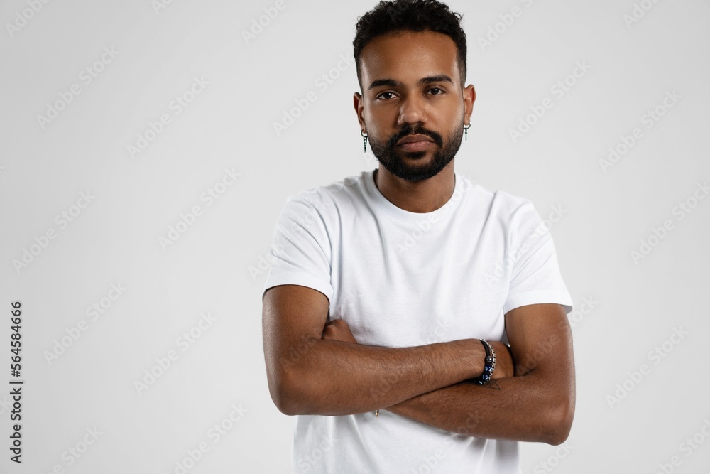 Handsome young african american guy posing in studio - isolated Handsome young african american guy posing in studio - isolated